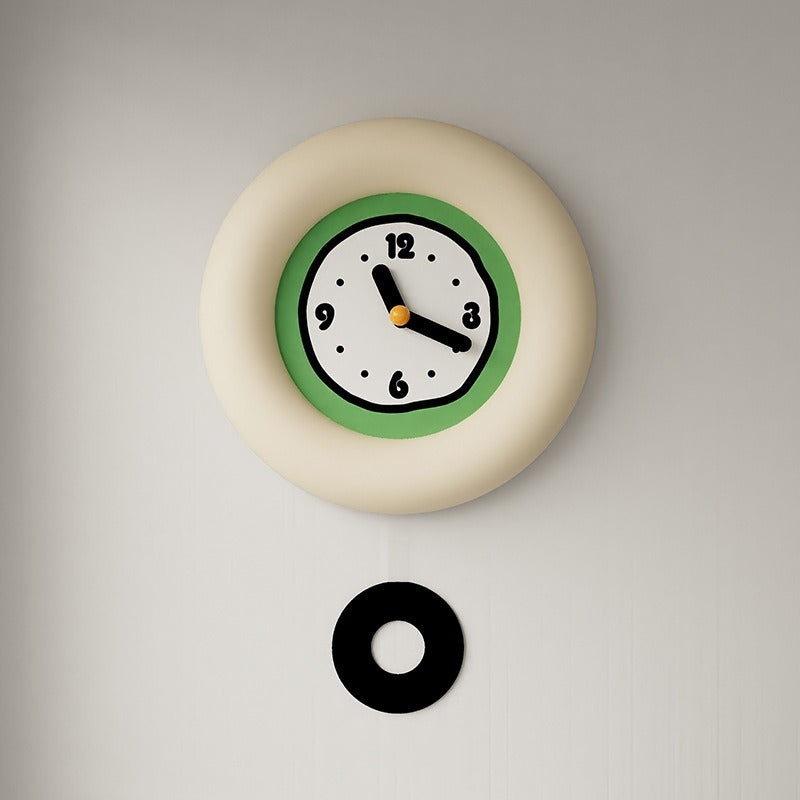 Soft green matcha clock on neutral wall