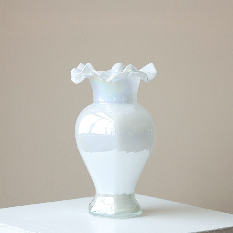 White ceramic vase with ruffled top