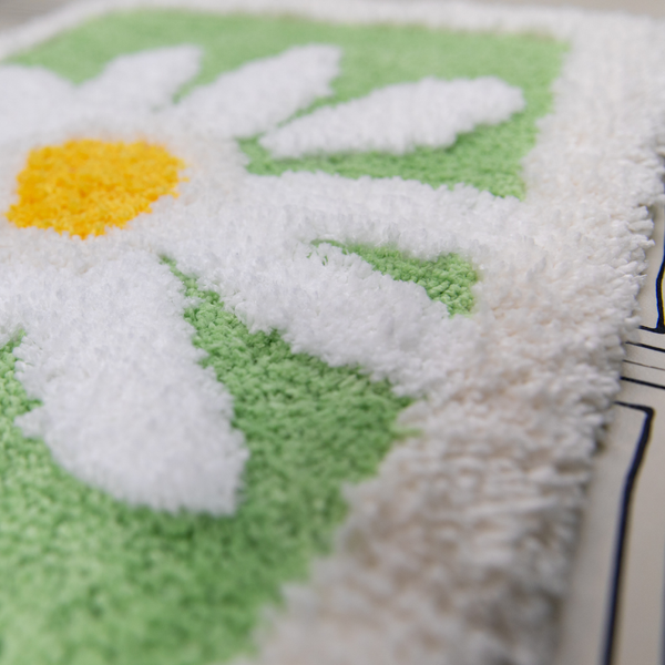 Close-up of a textured fabric with floral pattern