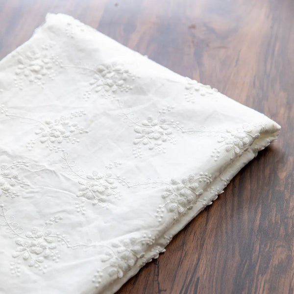 Vintage-inspired lace cloth with florals