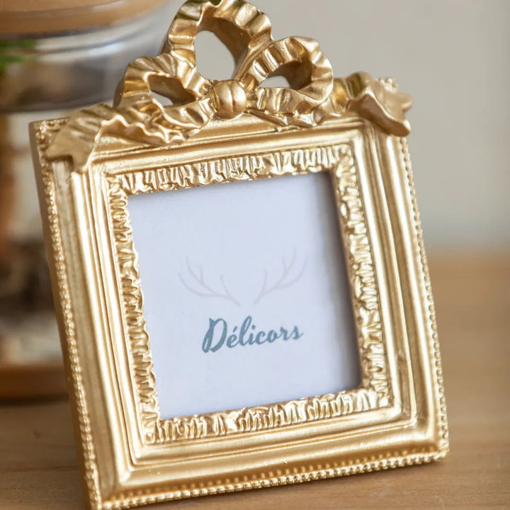 gold bow photo frame -- delicors