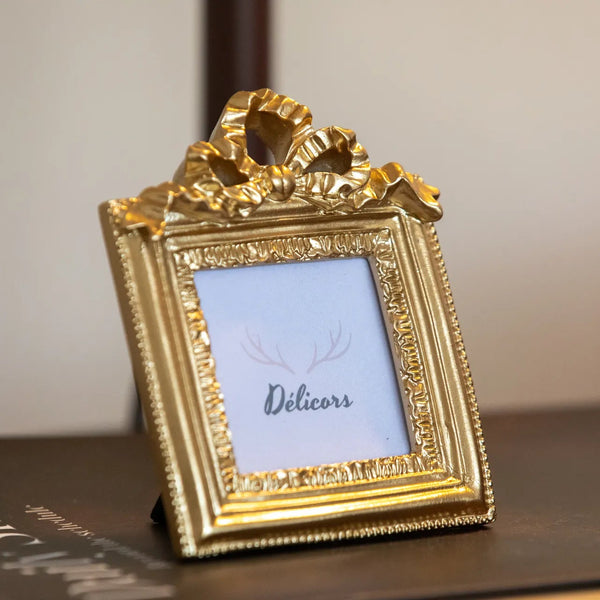 gold bow photo frame -- delicors
